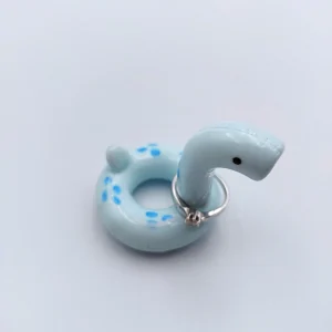 Dino pool float ring holder